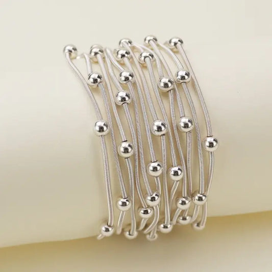 Beads and Coil Bracelet in Silver